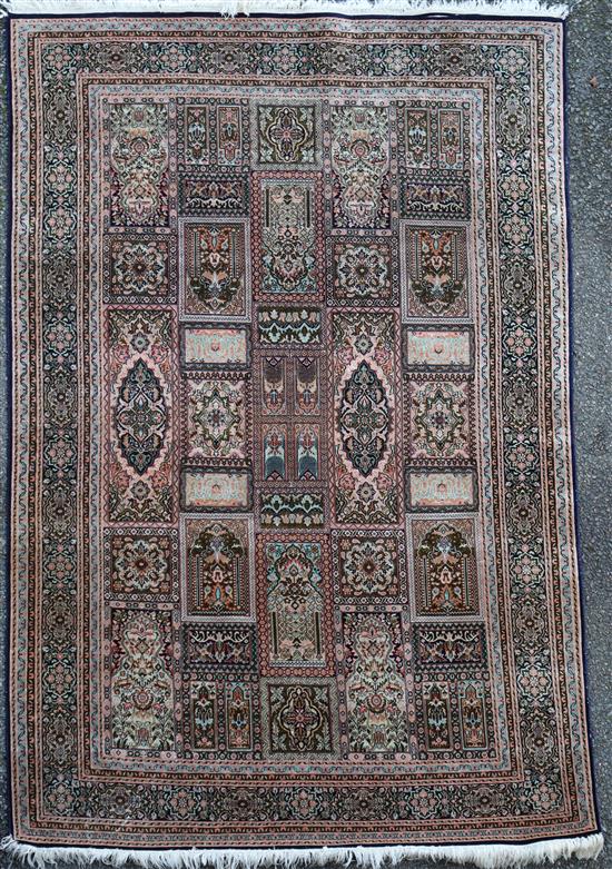 A Persian silk rug 184 x 123cm